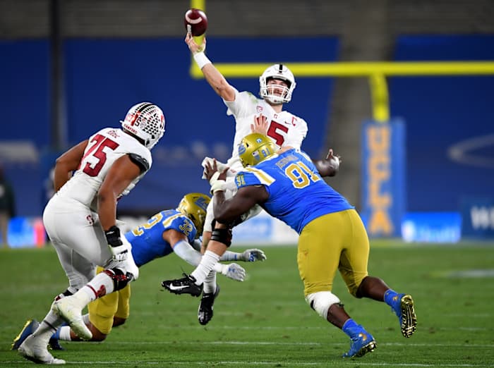 UCLA Bruins defensive lineman Otito Ogbonnia (91) pressures Stanford Cardinal quarterback Davis Mills (15). Mandatory Credit: Jayne Kamin-Oncea-USA TODAY Sports